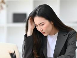 Woman working in office, busy businesswoman