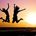 Happy women jumping