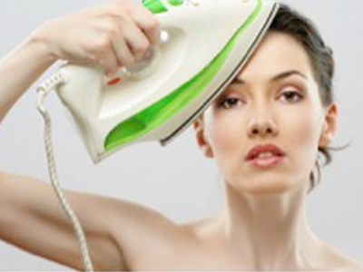 women ironng face featured