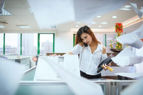 busy woman at photocopier