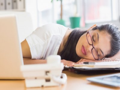 tired woman sleeping at her desk, sleep featured