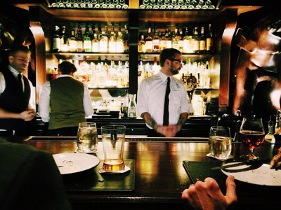 waiter at a bar, restaurant featured