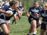 women playing rugby, women's sport week featured