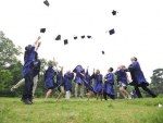 graduate students celebrating their graduation featured