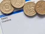 wage slip with pound coins featured
