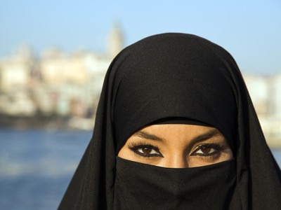 woman wearing a burka featured