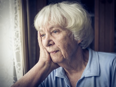 old woman sad about pensions featured