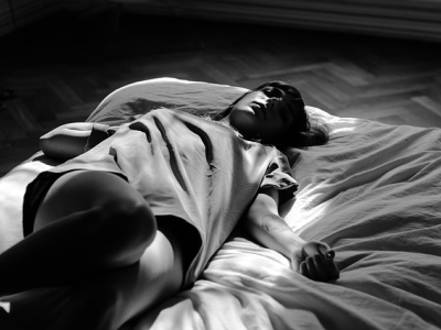 woman lying awake at night featured