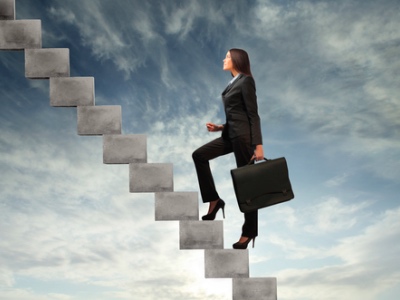 woman climbing a career ladder