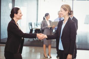 job interview, handshake, two women shaking hands, weakness