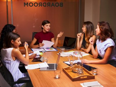 Businesswomen at an evening meeting in a boardroom, women on boards