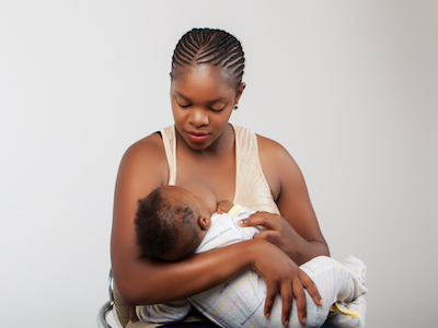 African black woman breastfeeding her child