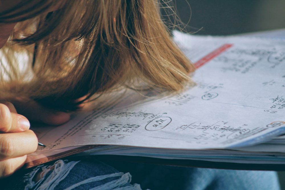 young girl doing maths homework
