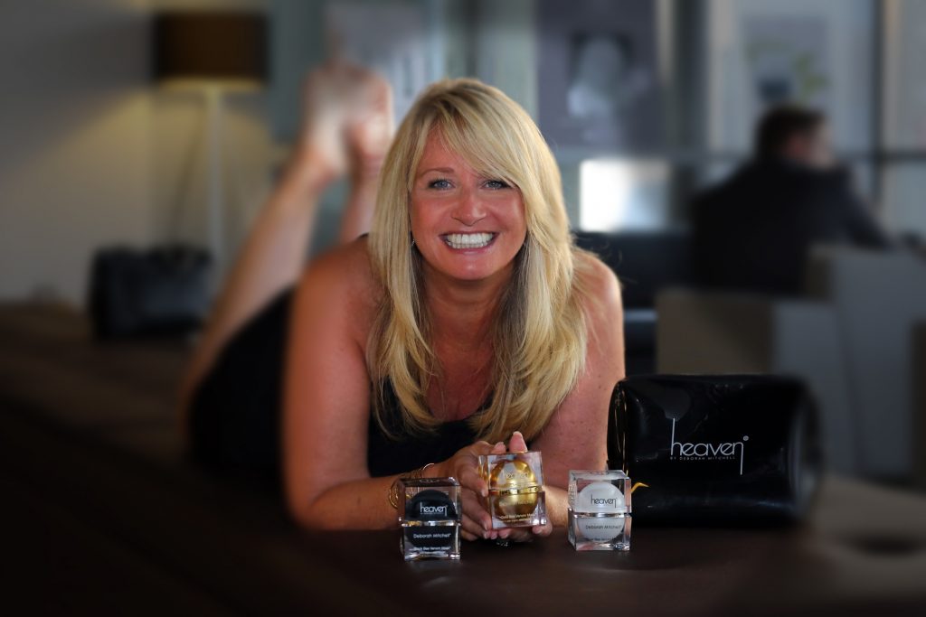Deborah Mitchell with Heaven Skincare products