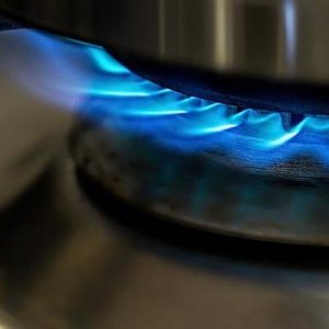 gas stove with blue flame, energy crisis