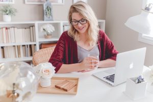 Woman working from home, working at a desk, female entrepreneur