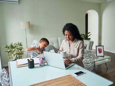mum with son while working