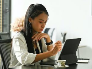 portrait of business woman using digital tablet, female entrepreneur