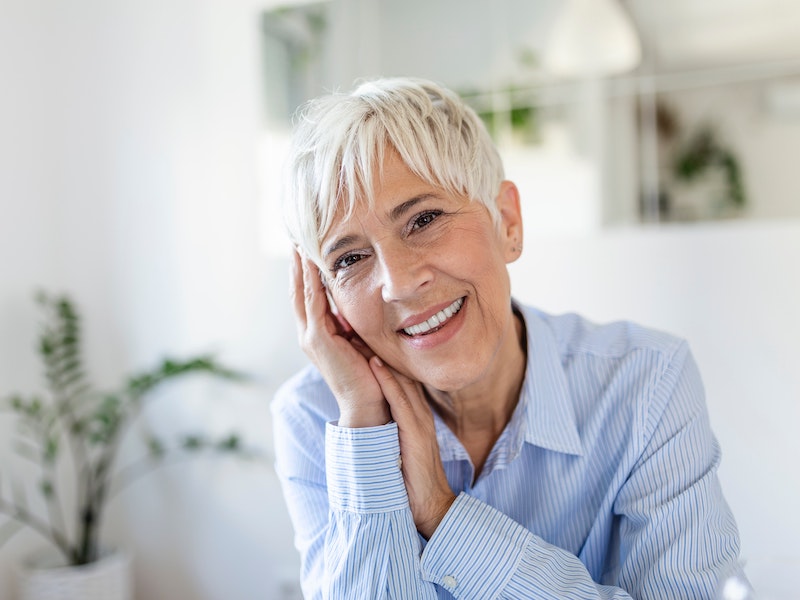 Smiling mature women at work, menopause support in the workplace