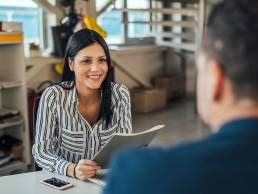 woman talking with colleague