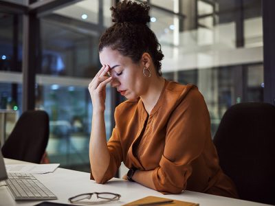 exhausted woman working in the office
