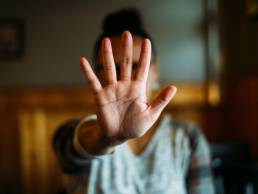 woman hand up stop