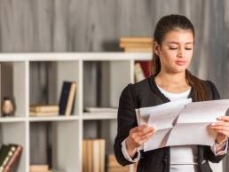 woman reading documents