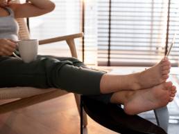 woman sat with barefoot