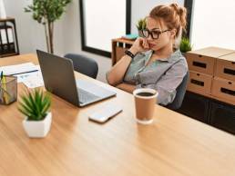 woman bored in the office